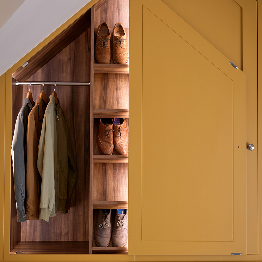 Handcrafted slopped ceiling fitted wardrobe